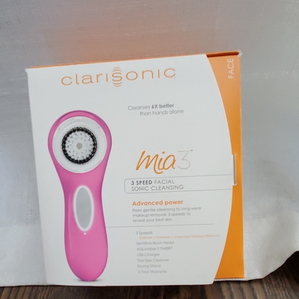 Clarisonic cleaning face device in pink